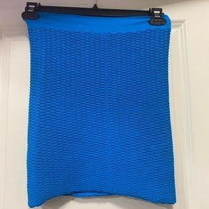 NWT, bebe slim mini tube skirt in turquoise. One size fits all